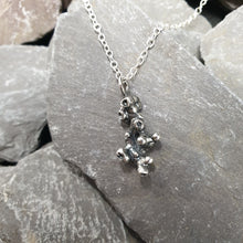 Load image into Gallery viewer, Organic coral like form cast in sterling silver, presented on a silver chain.