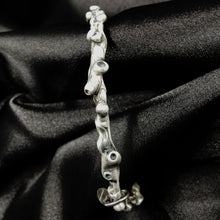Load image into Gallery viewer, Unusual bangle inspired by coral and natural formations growing in the silver.