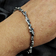 Load image into Gallery viewer, Unusual bangle inspired by coral and natural formations growing in the silver.