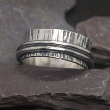 Load image into Gallery viewer, Spinning ring, with linear- bark like patterns on main ring and two plain rings as the 'spinners'.
