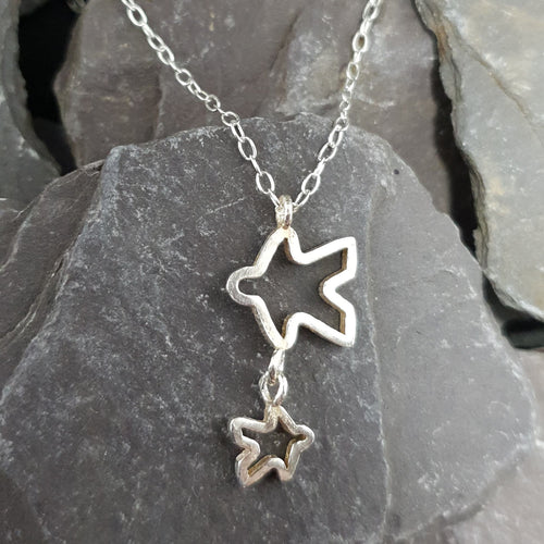 Meeple silhouette pendant duo