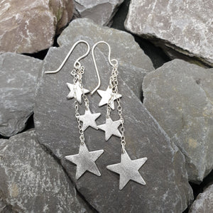 Hoshi- Dazzling dangly star earrings