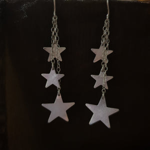 Hoshi- Dazzling dangly star earrings