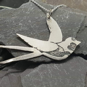 Swallow charity necklace