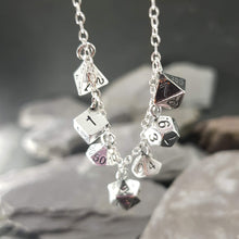 Load image into Gallery viewer, Seven mini polyhedral dice on a necklace, including a D4, D6, D100, D20, D8, D12 and aD10
