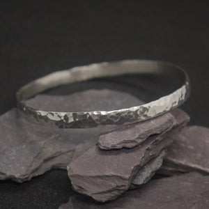Round hammered solid silver bangle