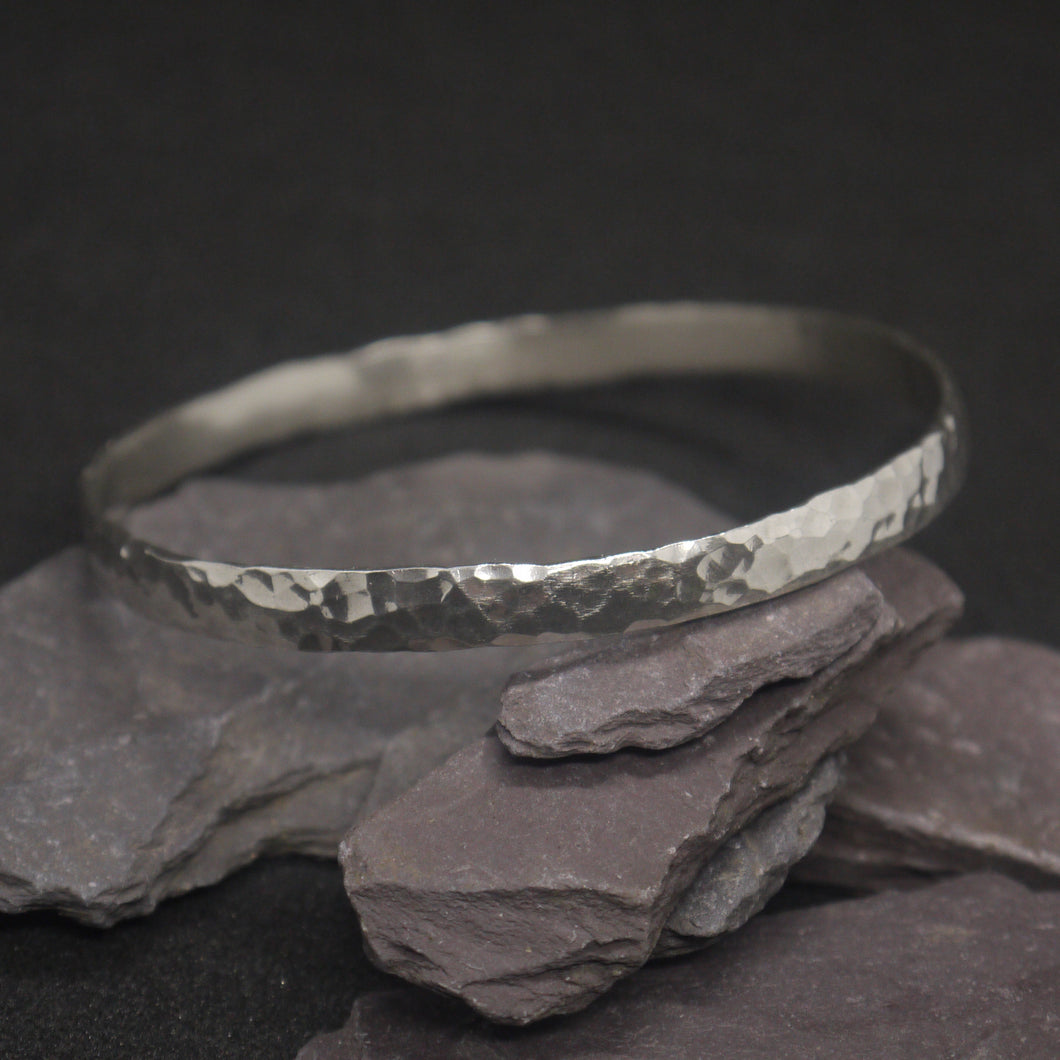 Round hammered solid silver bangle