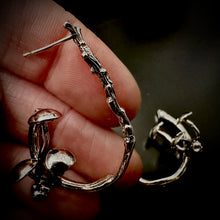 Load image into Gallery viewer, Half hoop twig earrings with three mushrooms growning on them.